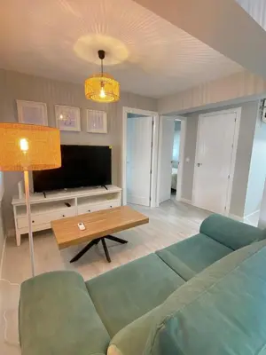 Una televisión o centro de entretenimiento en Macarena Boutique Apartment