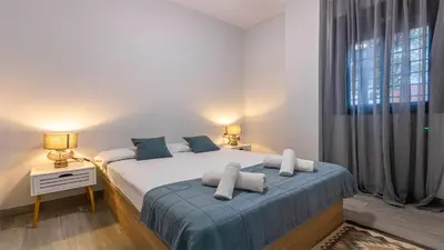 Cama o camas de una habitación en Córdoba Living
