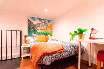 Cama o camas de una habitación en Edomus Santiago Duplex