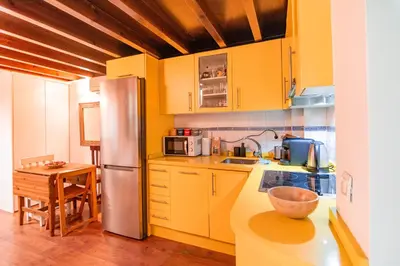 Una cocina o zona de cocina en Edomus Santiago Duplex