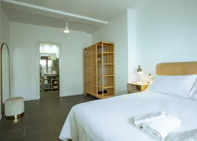 Cama o camas de una habitación en Apartamentos Turísticos Pilaria
