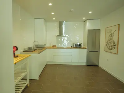 Una cocina o zona de cocina en Apartamentos Turísticos Pilaria
