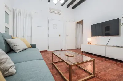 Una televisión o centro de entretenimiento en M. Auxiliadora Tranquilo y acogedor