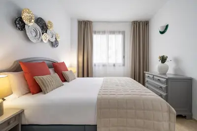 Cama o camas de una habitación en Magno Apartments Santa Justa II