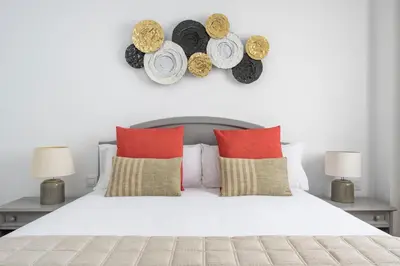 Cama o camas de una habitación en Magno Apartments Santa Justa II