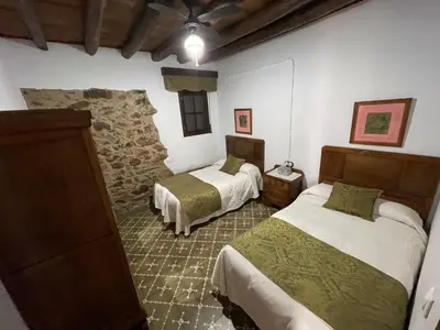 Cama o camas de una habitación en Vivienda Turistica de Alojamiento Rural El Jaral