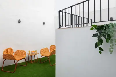 Zona de estar de La Muralla Suites by Alohamundi
