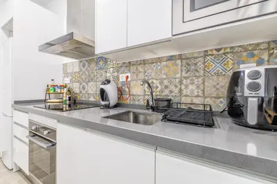 Una cocina o zona de cocina en Aires de Azahar & Parking Incluido