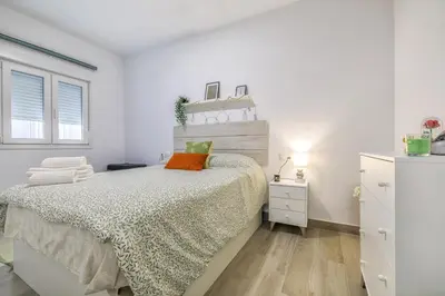 Cama o camas de una habitación en Aires de Azahar & Parking Incluido