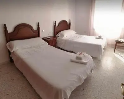 Cama o camas de una habitación en Apartamento Guadalrio