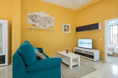 Una televisión o centro de entretenimiento en Veoapartment Jesús del Gran Poder B