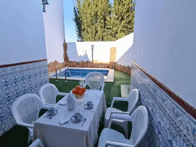 Piscina en o cerca de Country House Cuevas Bajas by Genil River