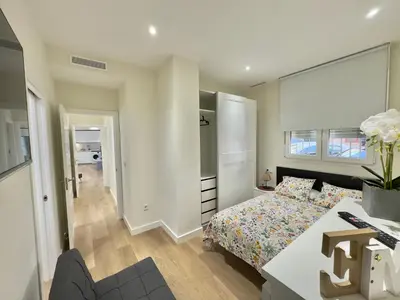 Cama o camas de una habitación en ApartHome SanRomán
