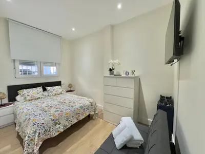 Cama o camas de una habitación en ApartHome SanRomán
