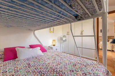 Cama o camas de una habitación en La casita del Abuelo