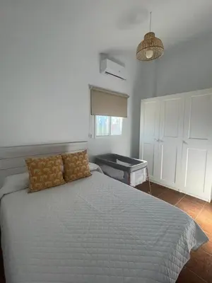 Cama o camas de una habitación en Casa Rural El Almendro