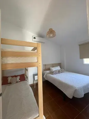 Cama o camas de una habitación en Casa Rural El Almendro