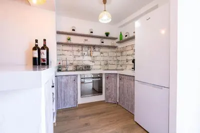 Una cocina o zona de cocina en 'El Paraiso de la Villa' by Turismodecalidad