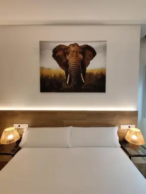 Cama o camas de una habitación en DreamsApt Feria