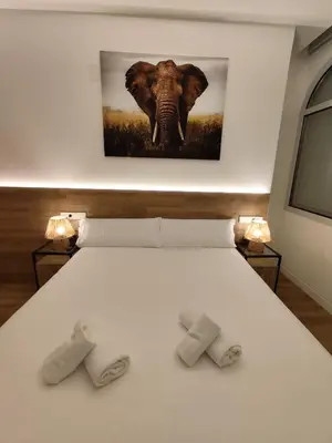 Cama o camas de una habitación en DreamsApt Feria