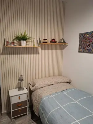 Cama o camas de una habitación en Habitación particular con baño privado