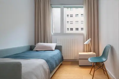 Cama o camas de una habitación en Magno Apartment Ramón Carande- Private Parking included