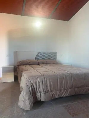Cama o camas de una habitación en Olimpya Rural Apartments