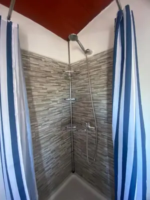 Un baño de Olimpya Rural Apartments