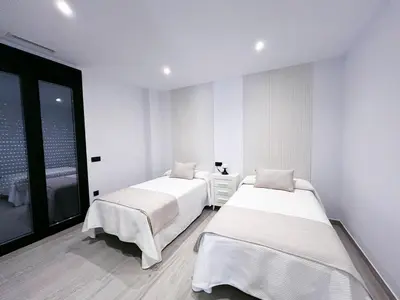 Cama o camas de una habitación en Adagio - Apartamentos La Clave