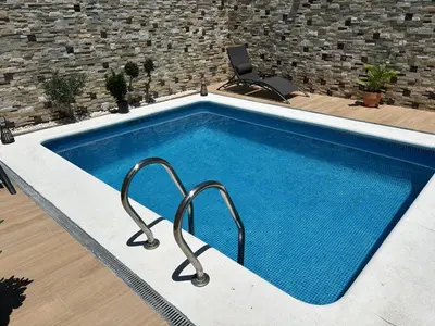 Piscina en o cerca de Bonita casa adosada
