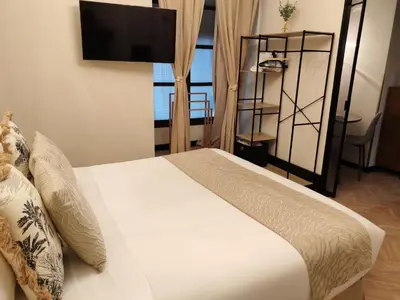 Cama o camas de una habitación en Alameda Experience