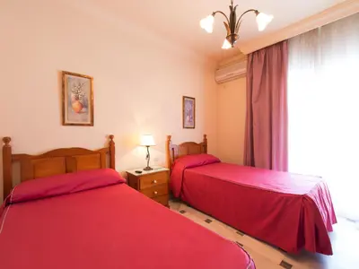 Cama o camas de una habitación en Hostal San Francisco