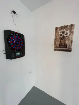 Una televisión o centro de entretenimiento en Alojamiento Rural Los Limones