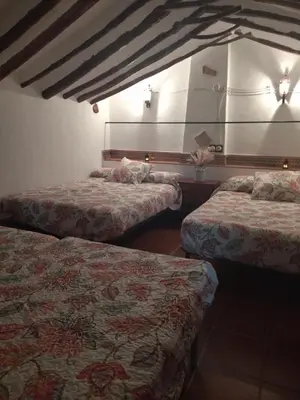 Cama o camas de una habitación en Alojamiento Rural Los Limones