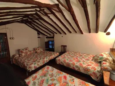 Cama o camas de una habitación en Alojamiento Rural Los Limones