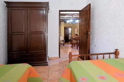 Cama o camas de una habitación en Cortijo Los Alazores, authentic cortijo with private pool