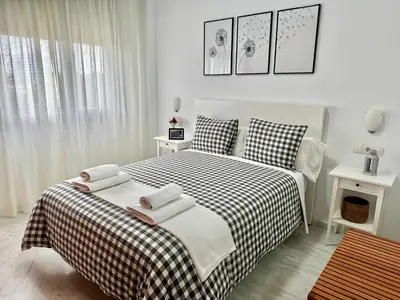 Cama o camas de una habitación en Apartamento acogedor - piscina - parking