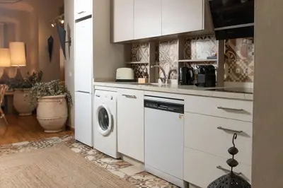 Una cocina o zona de cocina en Alohamundi Alameda IV