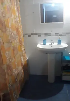 Un baño de Habitación 2 Camas en PISO COMPARTIDO