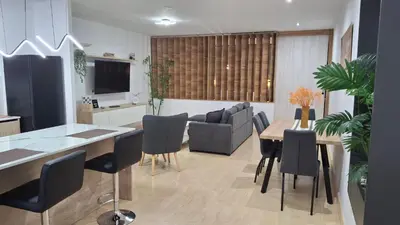 Una televisión o centro de entretenimiento en Loft Las Mercedes