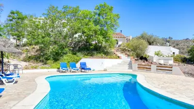 Piscina en o cerca de Cortijo Cuscurro Riogordo by Ruralidays