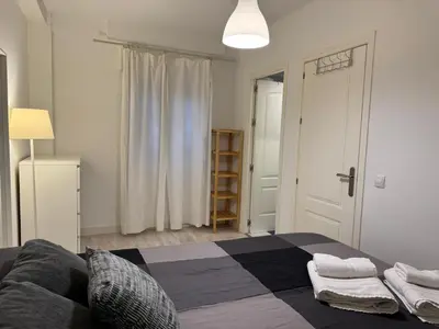 Cama o camas de una habitación en El refugio de San Miguel & parking gratuito