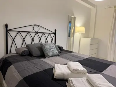 Cama o camas de una habitación en El refugio de San Miguel & parking gratuito