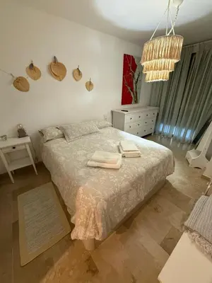 Cama o camas de una habitación en Apartamento Jardines del Brillante