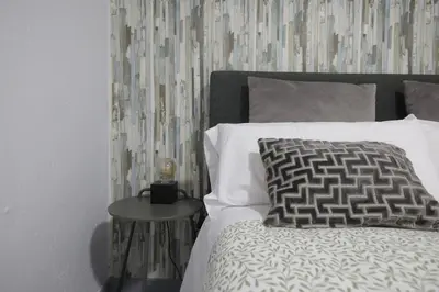 Cama o camas de una habitación en Lineros Suite A