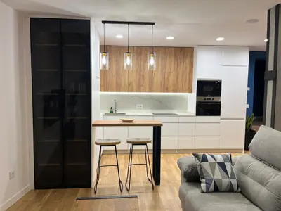 Una cocina o zona de cocina en Geysotur Central Córdoba Suite