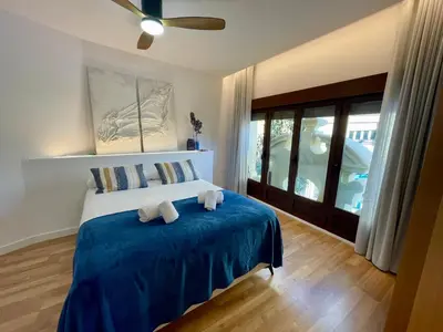 Cama o camas de una habitación en Geysotur Central Córdoba Suite