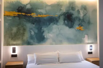 Cama o camas de una habitación en RentalSevilla Enjoy Nervión