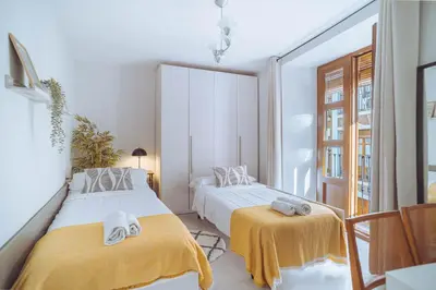 Cama o camas de una habitación en La Puentezuela, centro histórico, parking cercano, work friendly