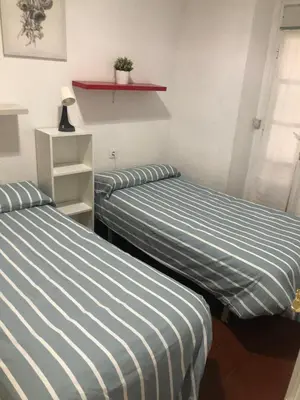 Cama o camas de una habitación en Apartamento Alameda 3ºA